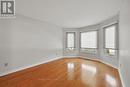 Open Living & Dining Areas with Hardwood Flooring
