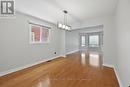 Open Dining & Living Areas with Hardwood Flooring