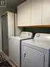main level laundry with shower stall