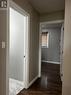 hallway leading to bathroom