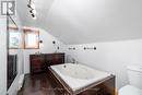 upstairs bathroom with soaker tub