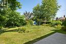 Fenced rear yard with storage shed