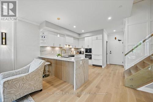 Rich Hardwood Floors Flow Seamlessly Throughout
