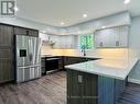 Custom kitchen with accent & task lighting.
