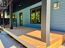 400 sq ft cover porch outdoor living space.
