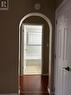 hallway leading to bedrooms and bathroom