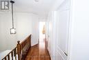 Hallway has beautiful hardwood floors