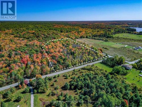 9+ Acres on corner lot