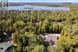 With a private lake & mins to Lake Huron.