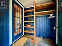 Enter the custom finish mud room with built-ins.