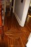 Beautiful inlay hardwood throughout the two levels