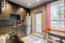 second flood renovated kitchen with black granite