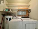 Laundry room with shelving.