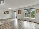Photo edited to show open space of living room/din