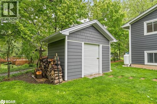 View of shed featuring view of scattered trees