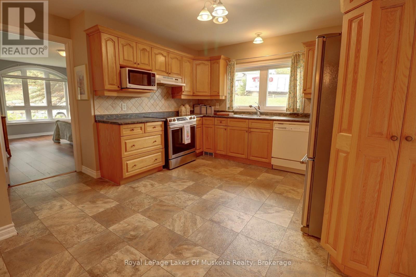 












106 - 31 DAIRY LANE

,
Huntsville (Chaffey),




Ontario
P1H2L7

