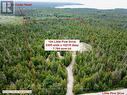 7.78 acre lot fronting on two Municipal Roads.