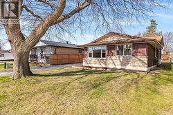 View of front of home featuring brick siding