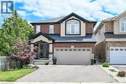 Brick and stucco facade with dark trim accents