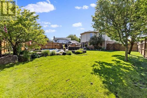 Over sized lot with pool AND grass to play on