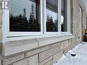 Quality stone front including window sills.