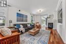 Living Room Highlighted by a Woodburning Fireplace