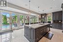 Dream Kitchen Showcases Dual Walkouts to Backyard
