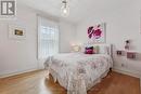 Second Bedroom with Hardwood Flooring