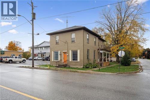 View of front of house featuring brick siding