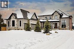 Stone and brick exterior 4.5 car garage