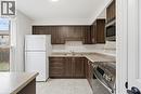 Upgraded kitchen offers 4 appliances, lots of cabinetry and counter space!