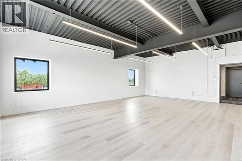 Unfurnished living room featuring light wood finished floors