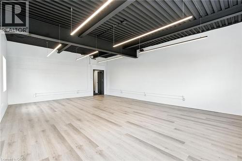 Unfurnished room featuring light wood-style flooring and baseboards