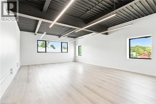 Unfurnished room featuring light wood-type flooring