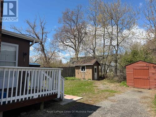 Large, private back yard, two storage sheds