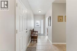 A bright and welcoming foyer with garage access