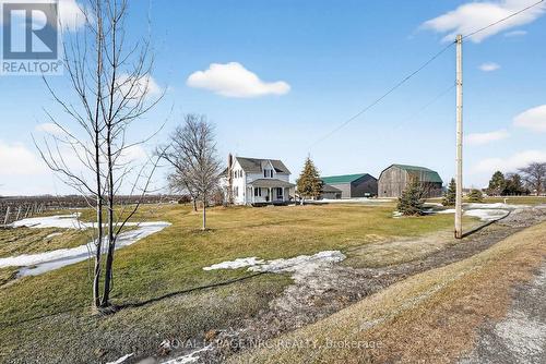 Side view. Barns are on neighbour's lot.