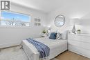 3rd Bedroom with light wood-style floors