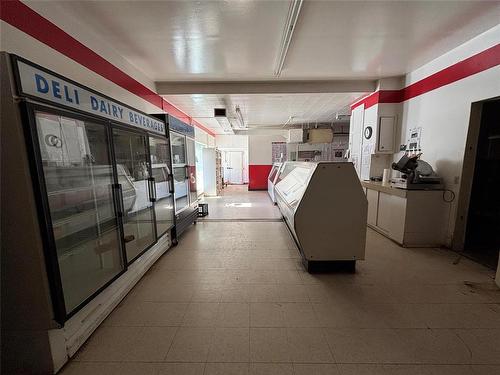 retail area with coolers and display cases