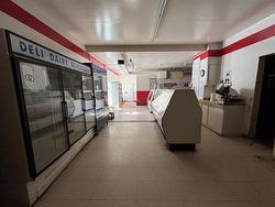 retail area with coolers and display cases