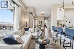 Living area with light wood finished floors