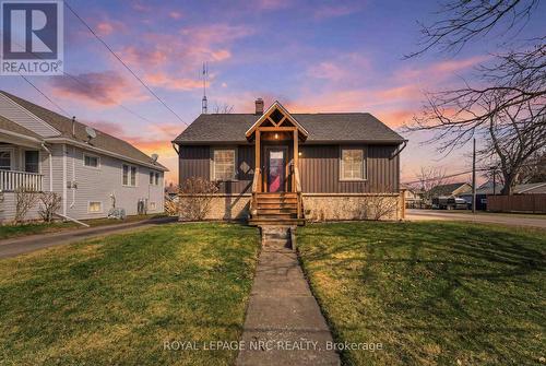 Perched on a corner lot facing west