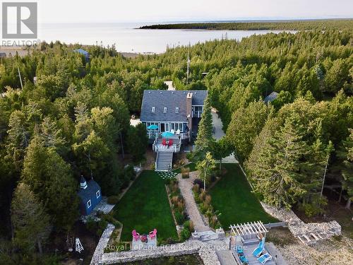 Professionally landscaped one acre property.