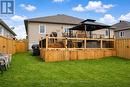 Backyard and deck and gate to yard