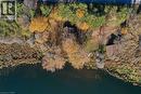 Aerial overview of property's location with a large body of water