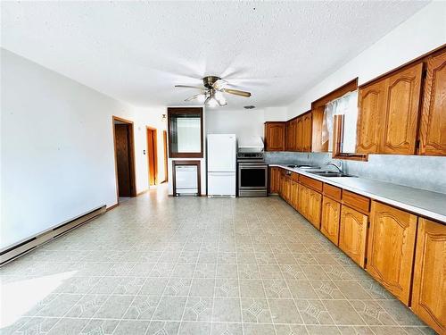 A massive amount of kitchen cabinetry and counters.