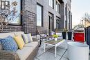 This property features an outdoor patio with brick exterior, offering an inviting space for relaxation or entertaining