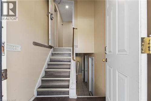 Stairs featuring baseboards