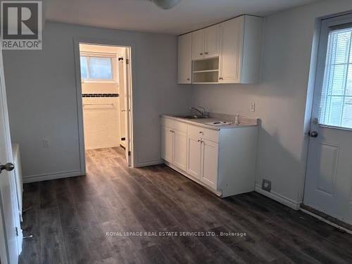 Basement Kitchen with walkout /up