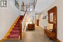 Entry Hallway and Primary Stairs to Bedroom Level